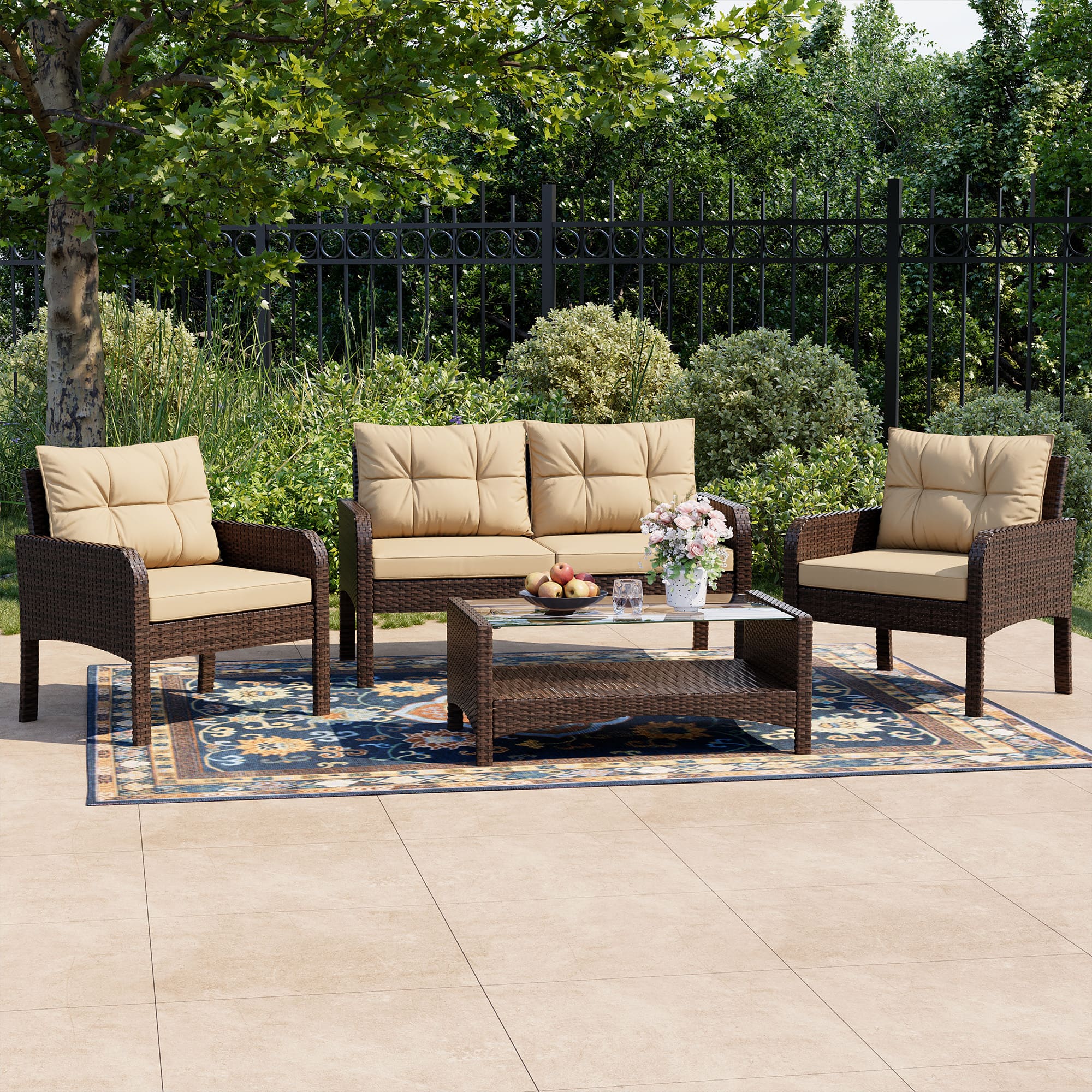 Rattan Patio Furniture Set Arranged on a Backyard Deck