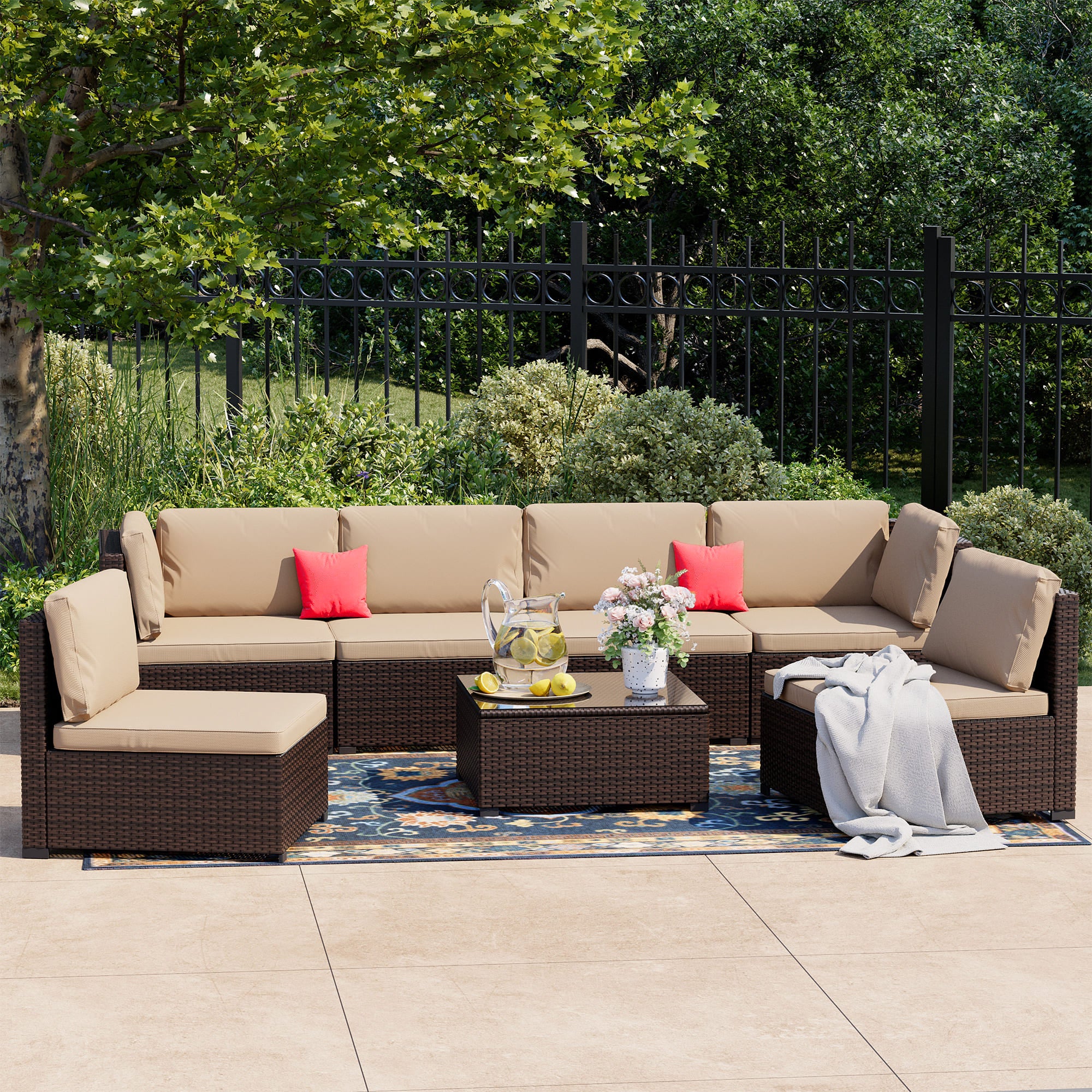 7-Piece Rattan Patio Furniture Set Arranged on Backyard Deck